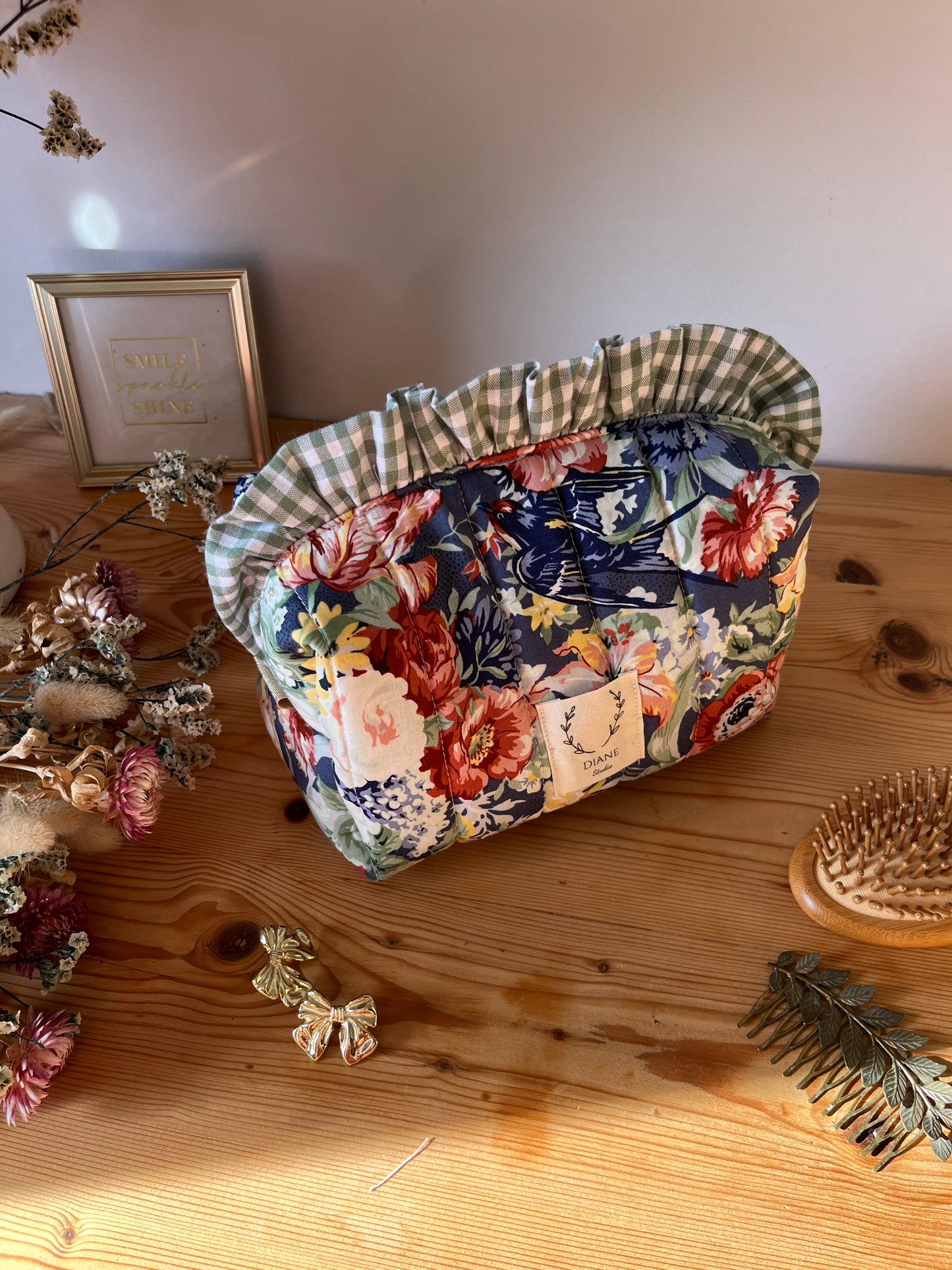 Colette's quilted toiletry bag and its bow
