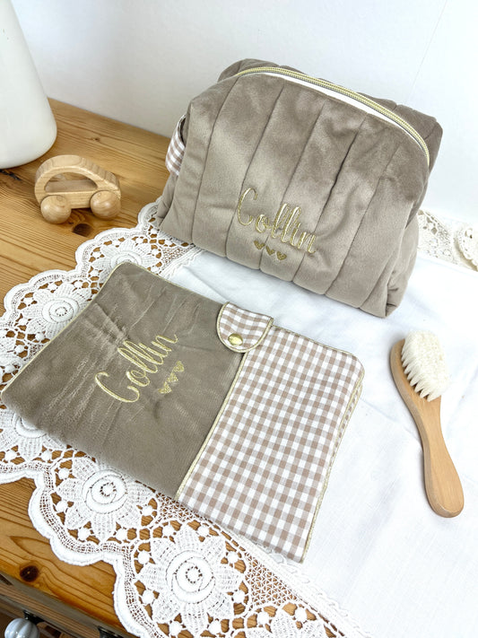 Set includes: Toiletry bag, blanket, doll, notebook cover, and bonnet