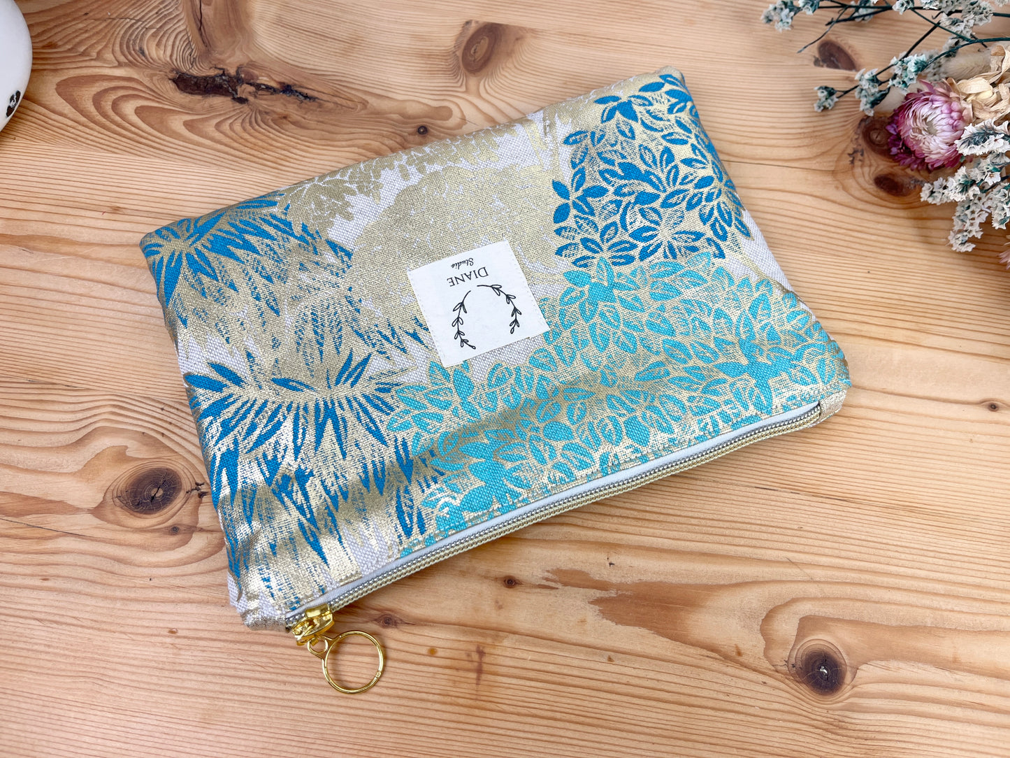 Babette the flat clutch with golden foliage