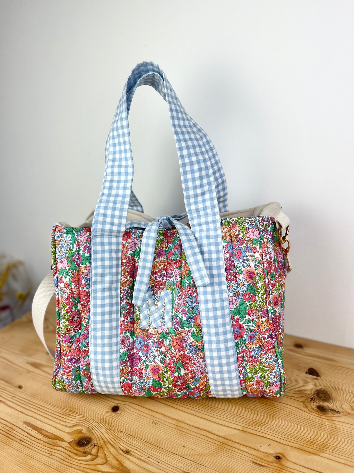 The Aurore Margaret bag in tutti frutti and blue gingham