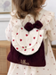 Le sac à dos Églantine gaze coeurs rouges et velours cerise