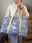 The 100% customizable ruffled diaper bag