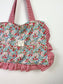 The small ruffled tote bag is 100% customizable.