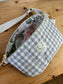 The Eléonore sherpa fanny pack in pink tulips