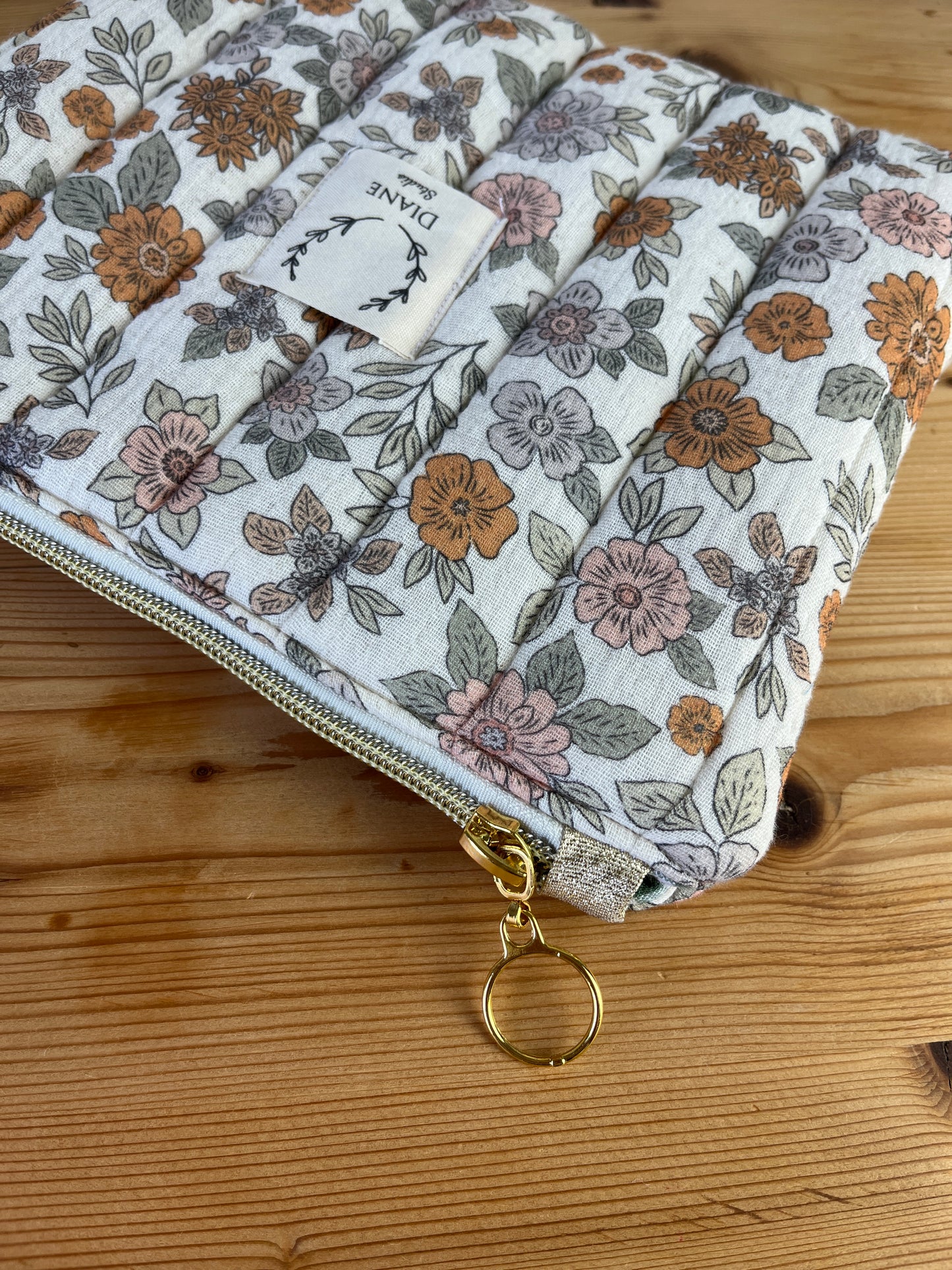 Babette the flat gold jacquard clutch