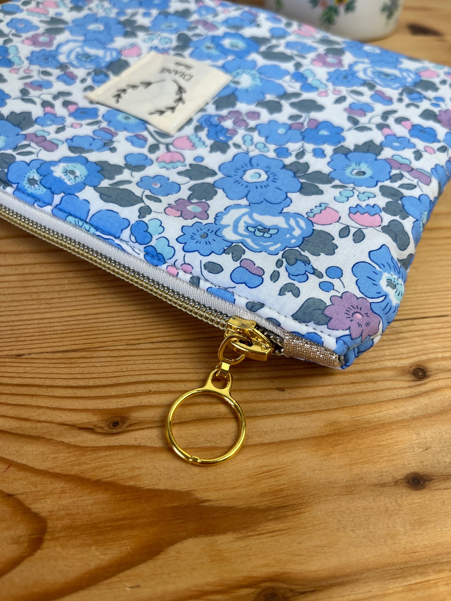 Babette the flat gold jacquard clutch