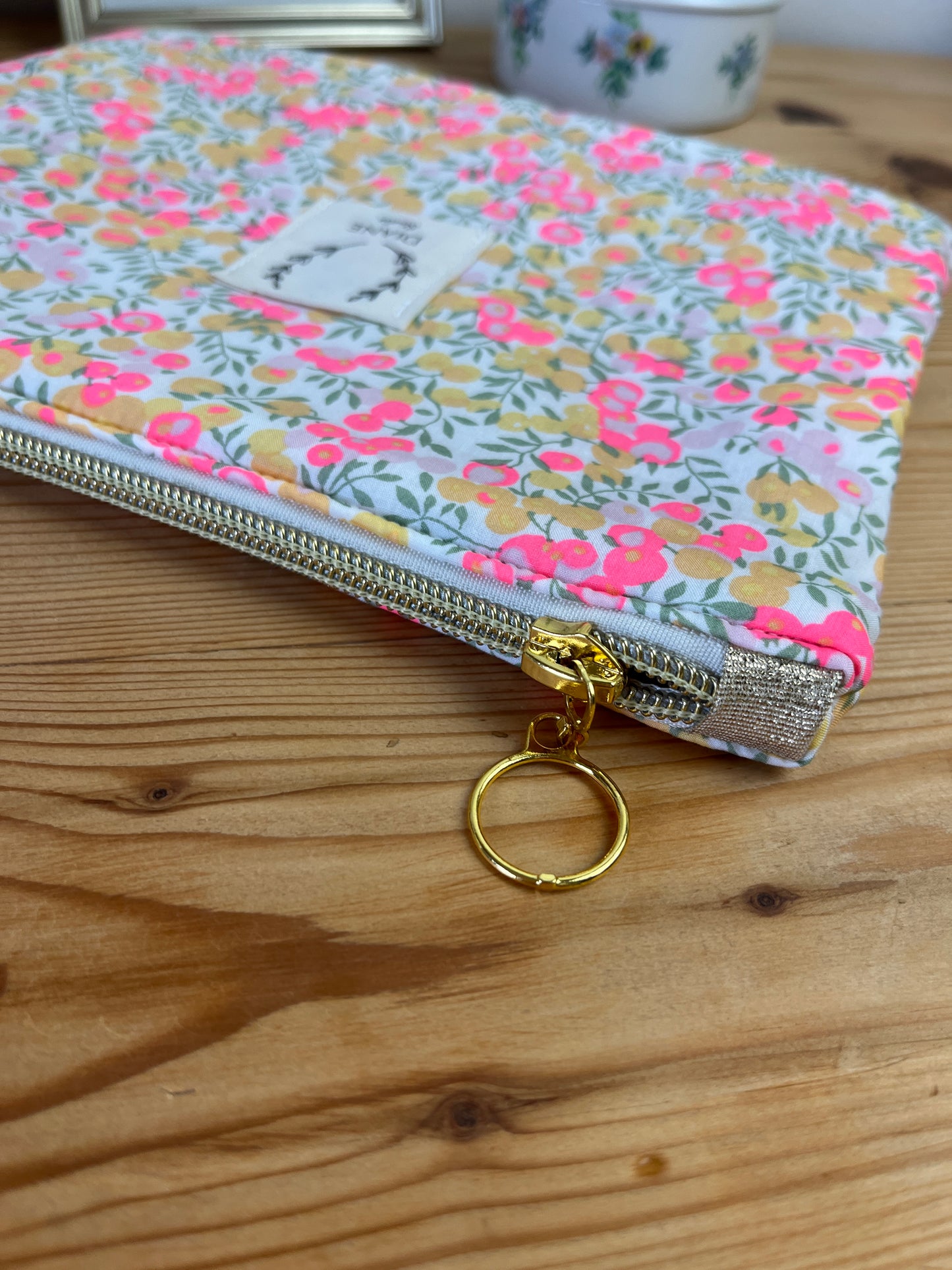 Babette the flat gold jacquard clutch