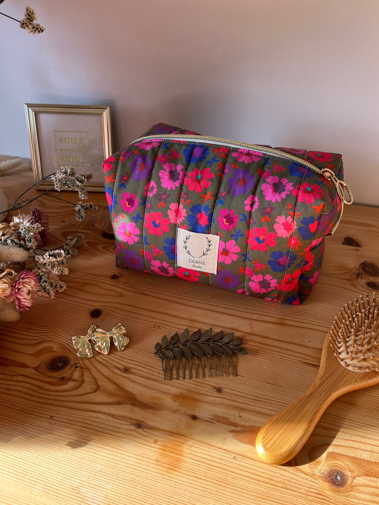 Colette's quilted toiletry bag and its bow