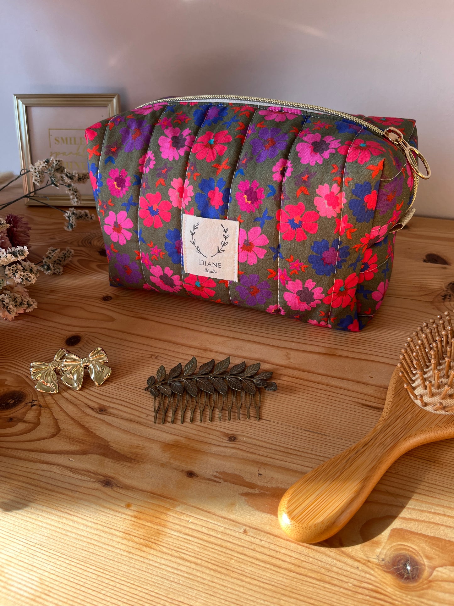 Colette's quilted toiletry bag and its bow