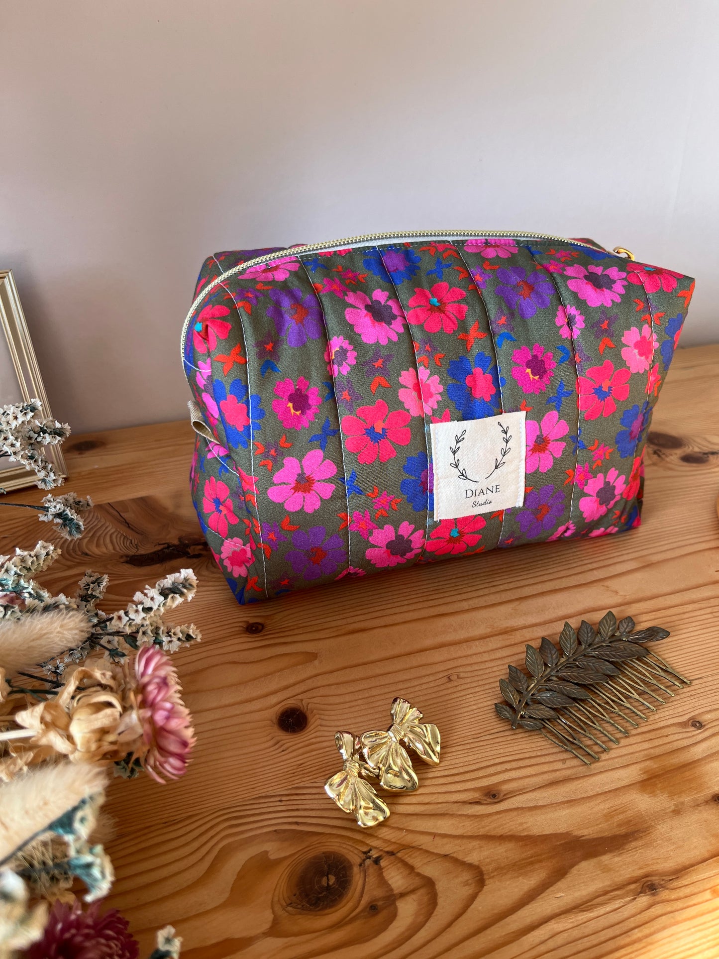 Colette's quilted toiletry bag and its bow