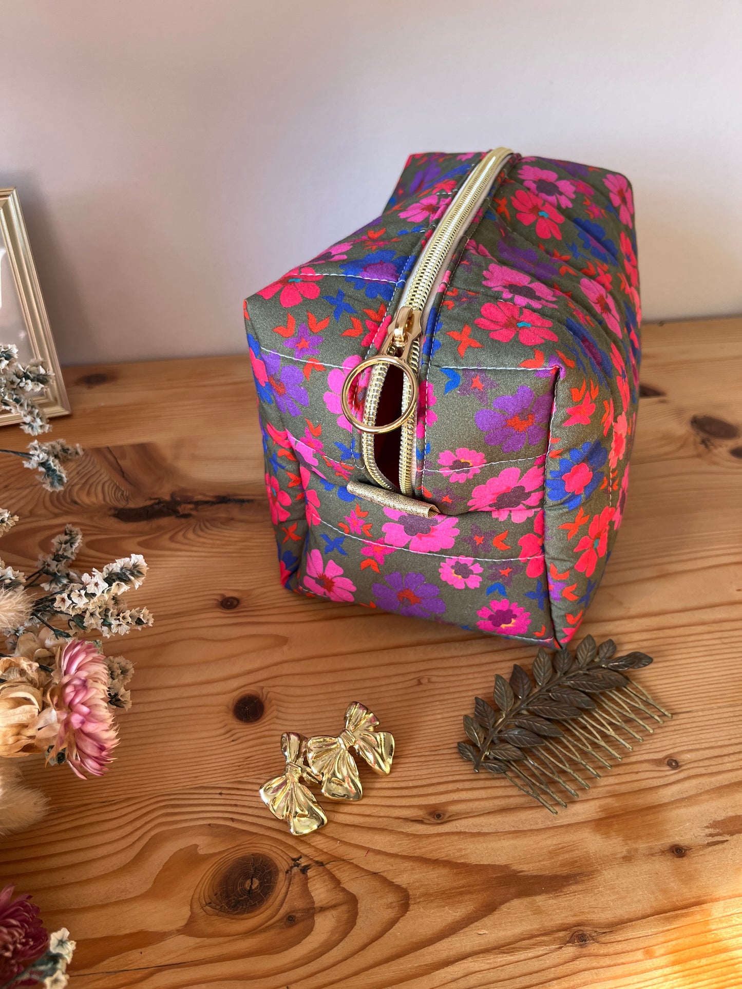 Colette's quilted toiletry bag and its bow
