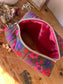 Colette's quilted toiletry bag and its bow