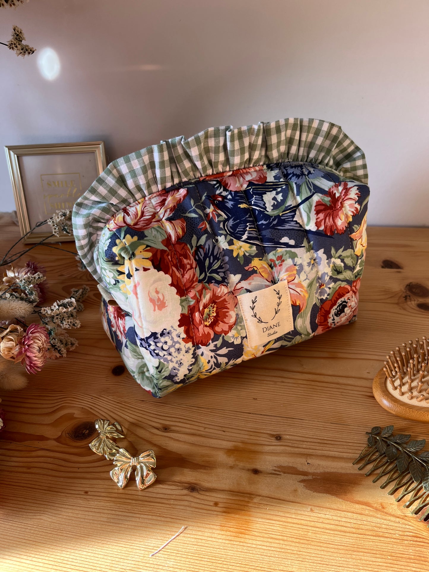 Colette's quilted toiletry bag and its bow
