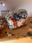 Colette's quilted toiletry bag and its bow