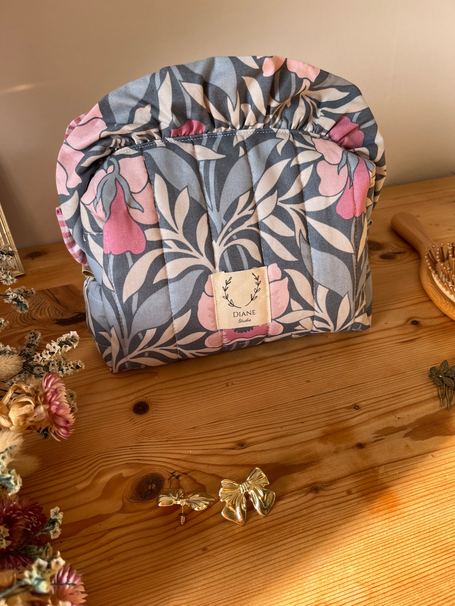Colette's quilted toiletry bag and its bow
