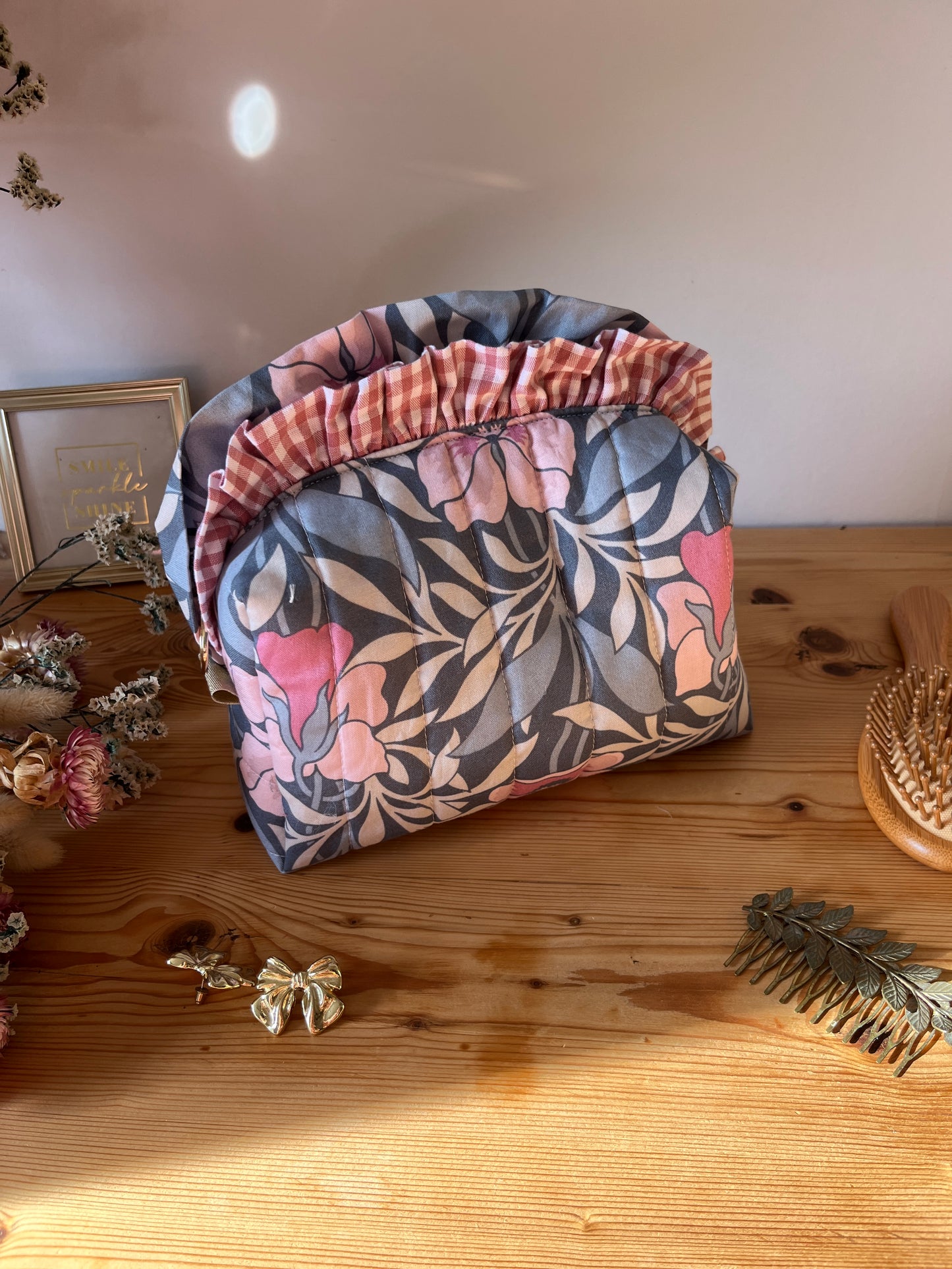 Colette's quilted toiletry bag and its bow