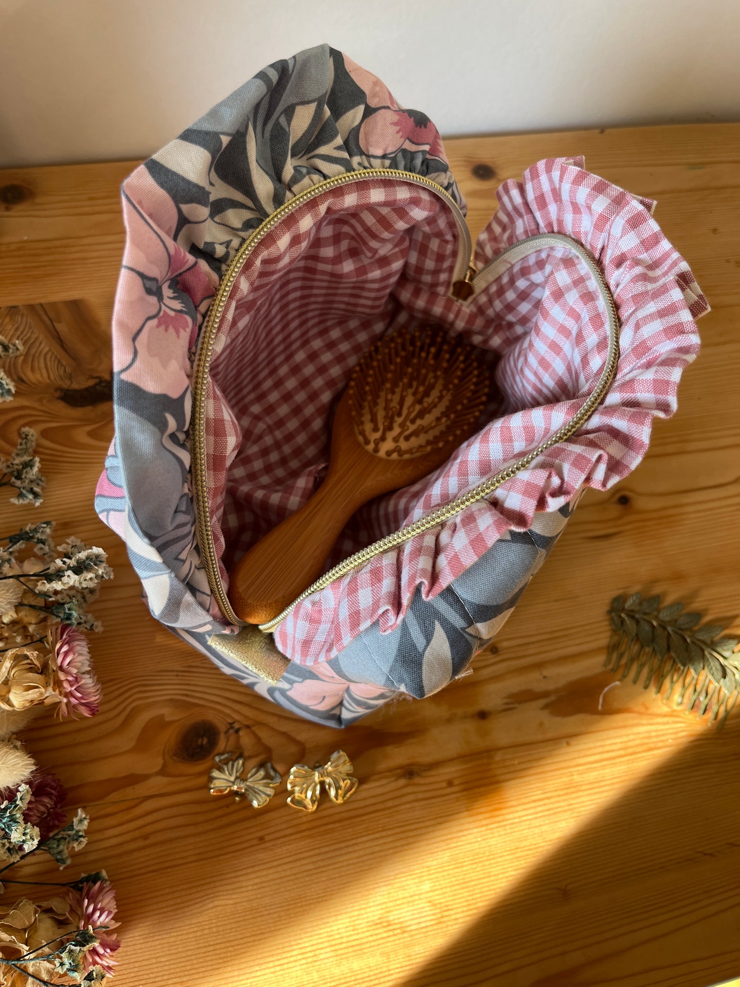 Colette's quilted toiletry bag and its bow