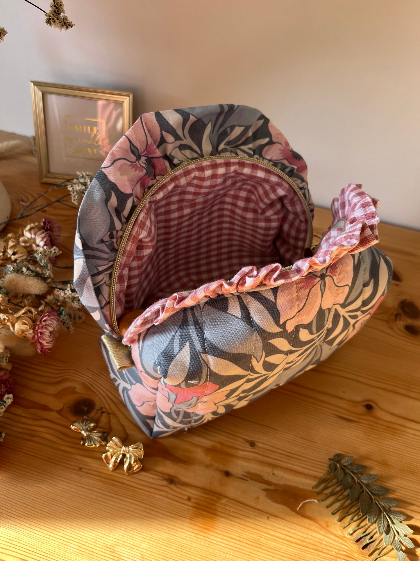 Colette's quilted toiletry bag and its bow