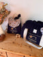 Set: Eglantine duffel bag and backpack with initial lace