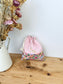 Pochon personnalisé gaze rose poudré et bloom