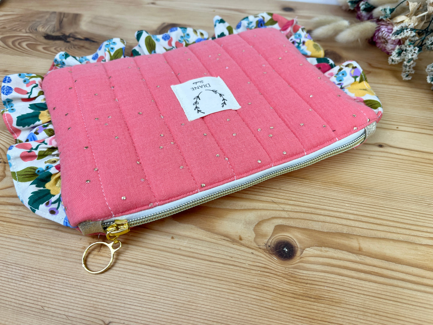 The Jeanne pouch is 100% customizable