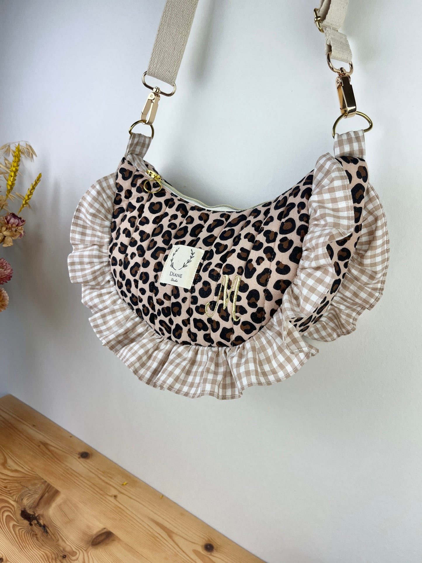 Milan the quilted crescent bag in leopard and beige gingham