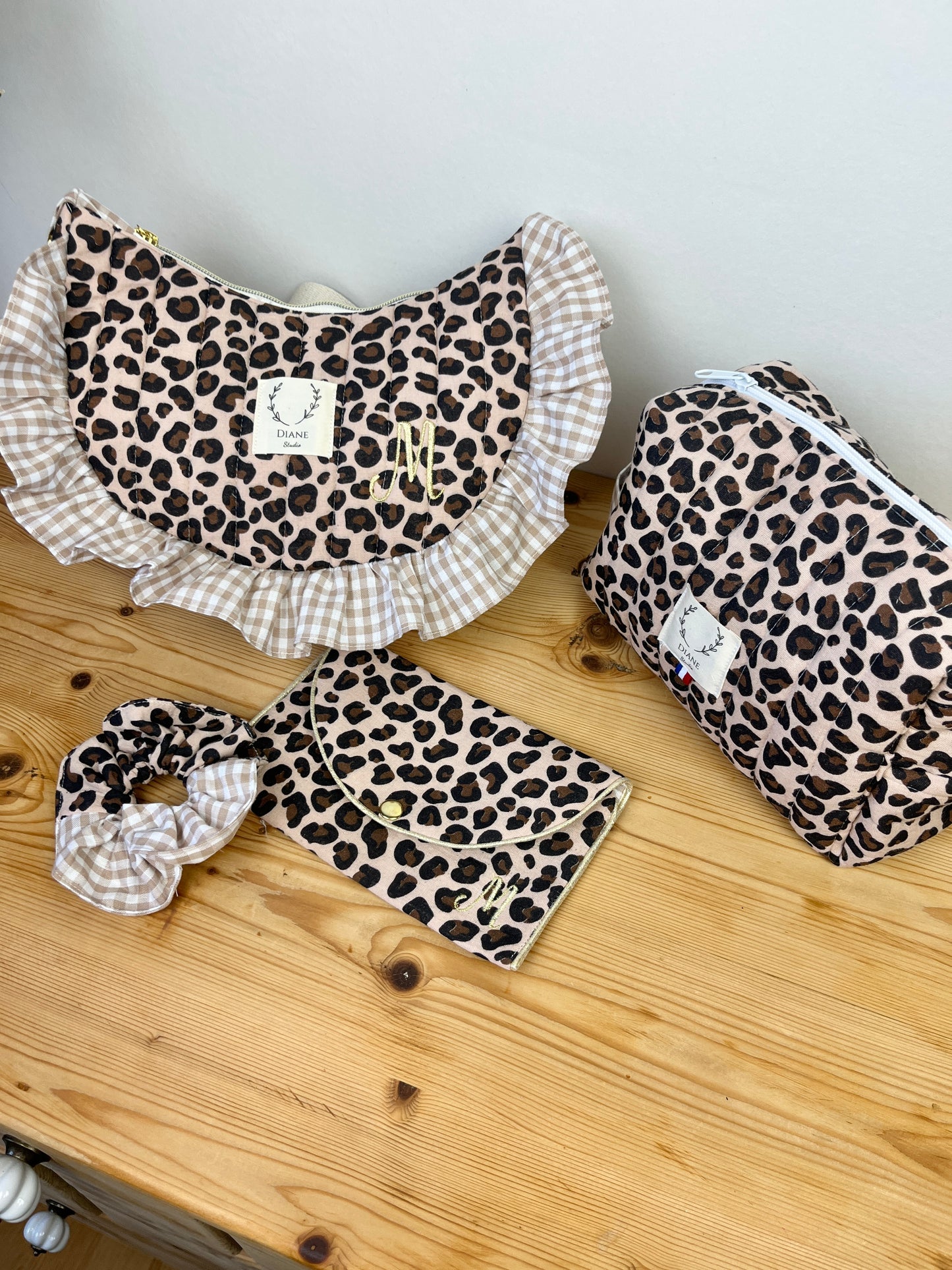 Set includes: Milan bag, toiletry bag, scrunchie and wallet 