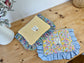 Quilted flat clutch bag in yellow gingham and Liberty of London