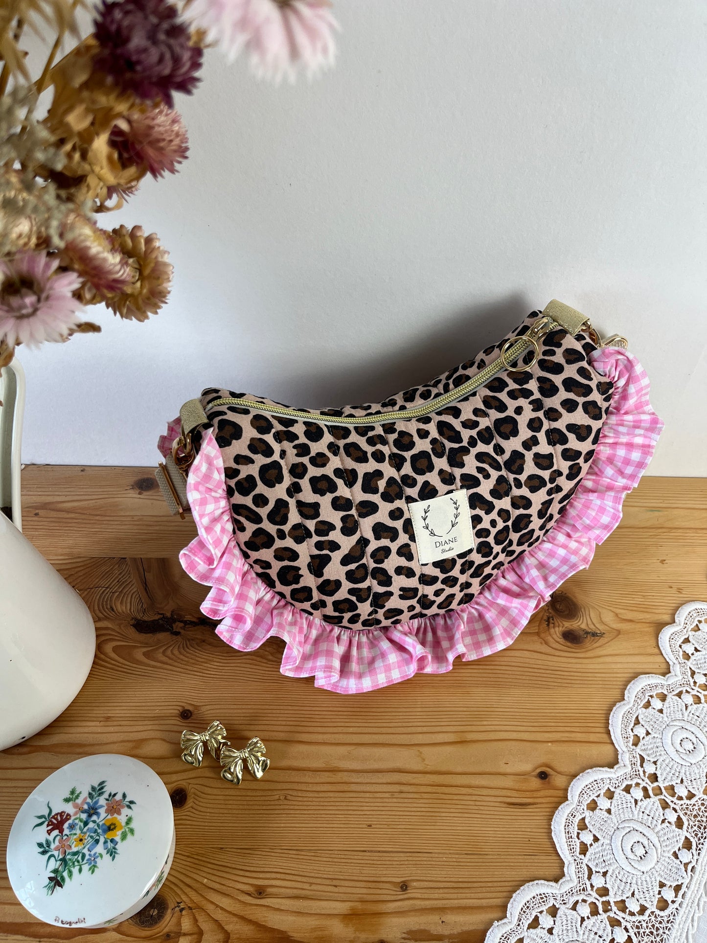 Milan the quilted crescent bag in leopard and beige gingham