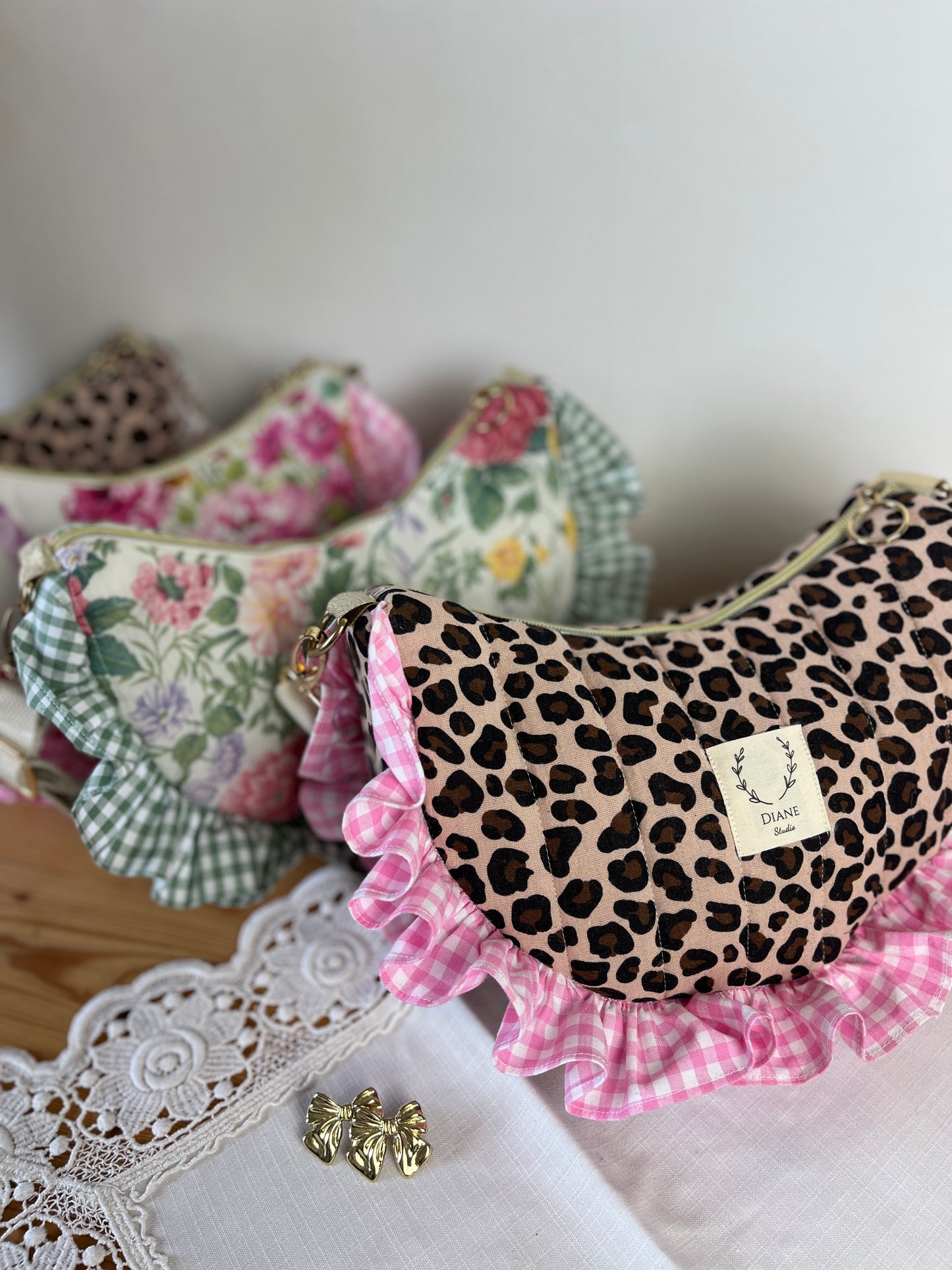 Milan the quilted crescent bag in leopard and beige gingham