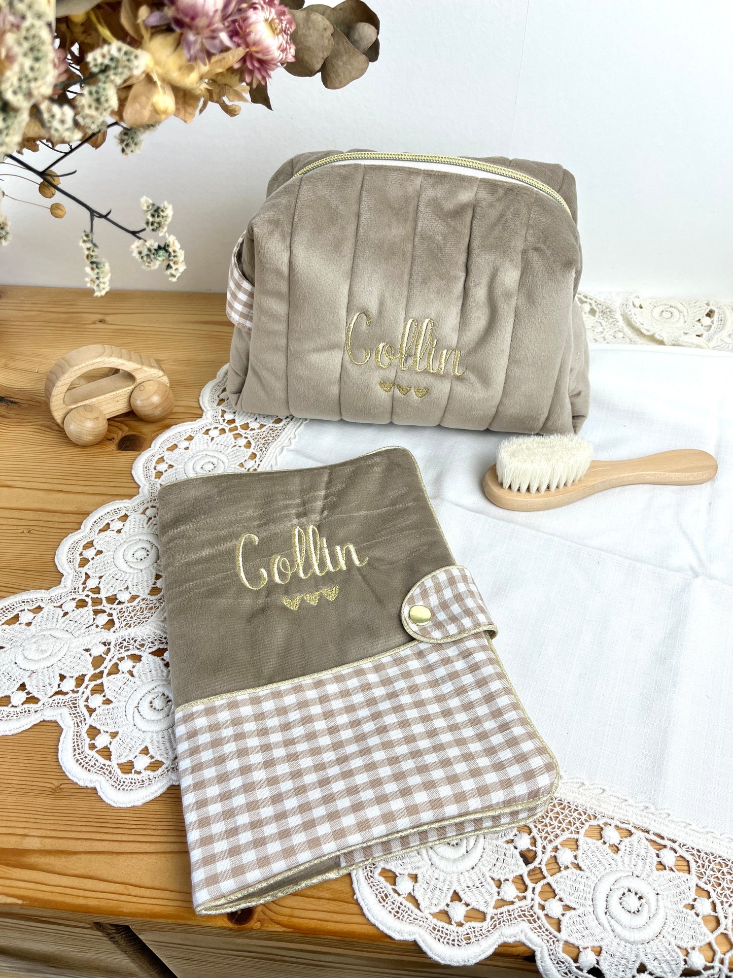 Set includes: Toiletry bag, blanket, doll, notebook cover, and bonnet 
