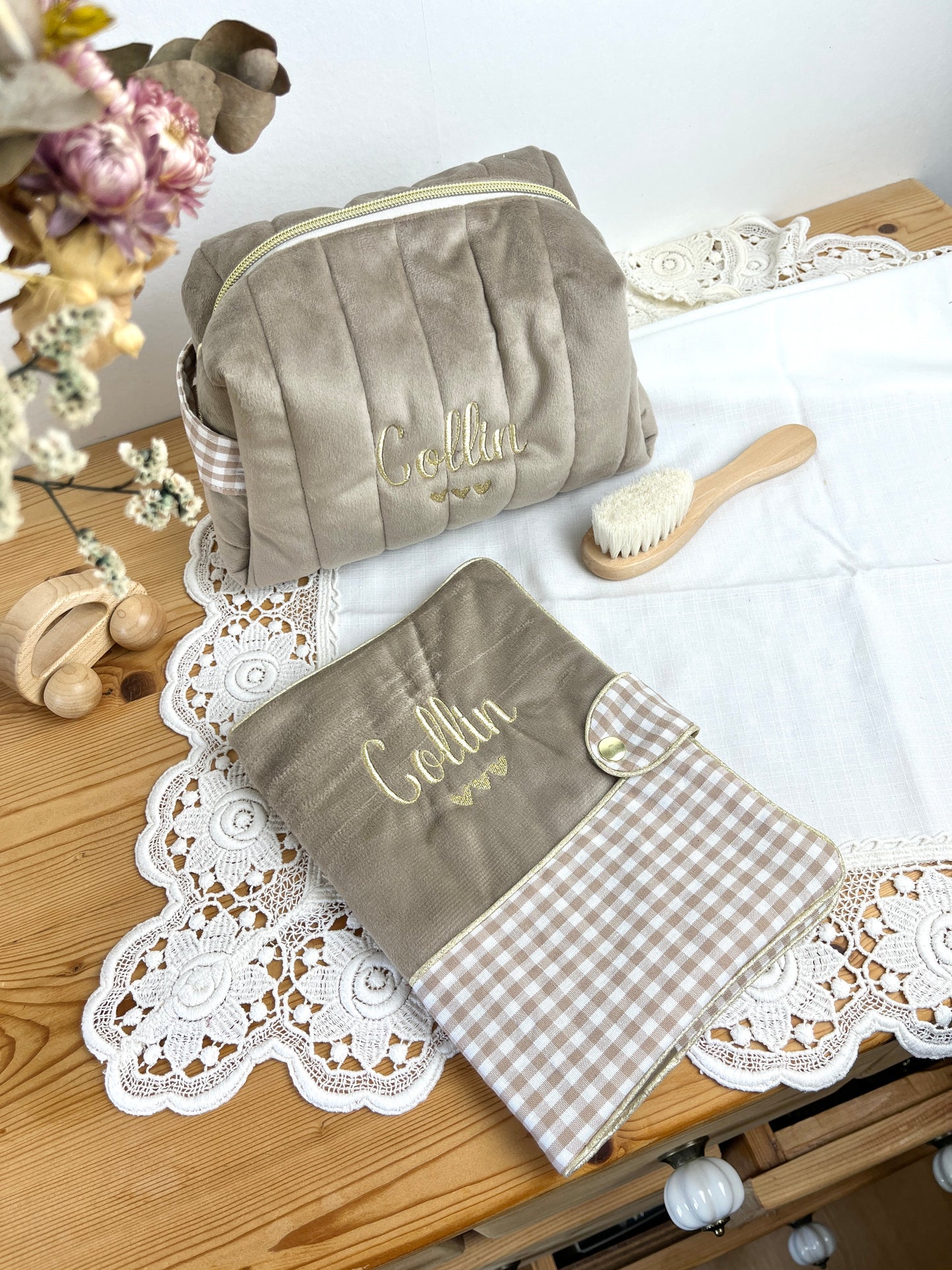 Set includes: Toiletry bag, blanket, doll, notebook cover, and bonnet 