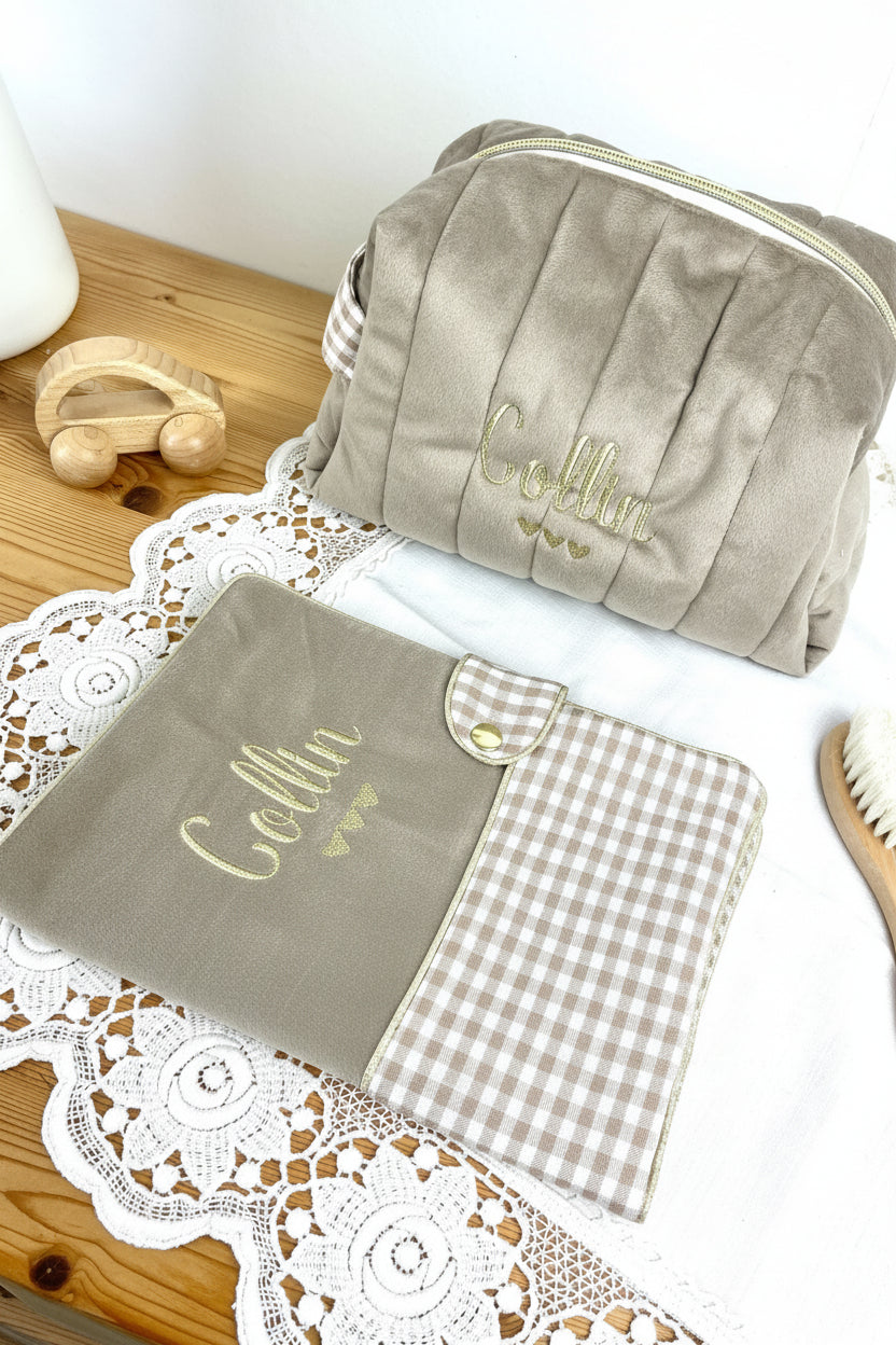 Set includes: Toiletry bag, blanket, doll, notebook cover, and bonnet 