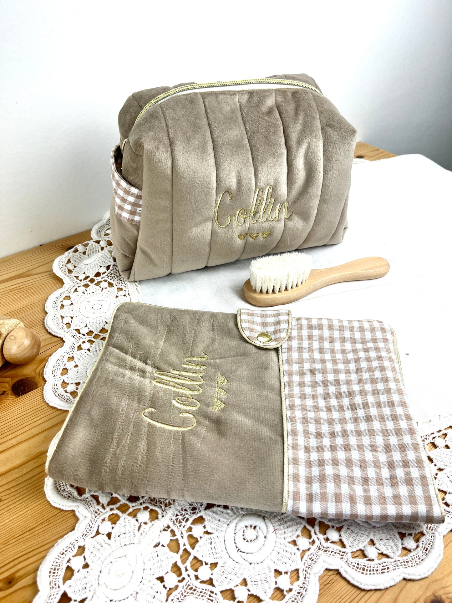 Set includes: Toiletry bag, blanket, doll, notebook cover, and bonnet 