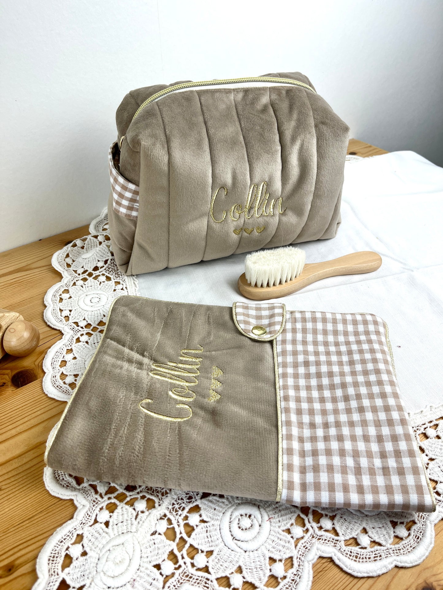 Set includes: Toiletry bag, blanket, doll, notebook cover, and bonnet 