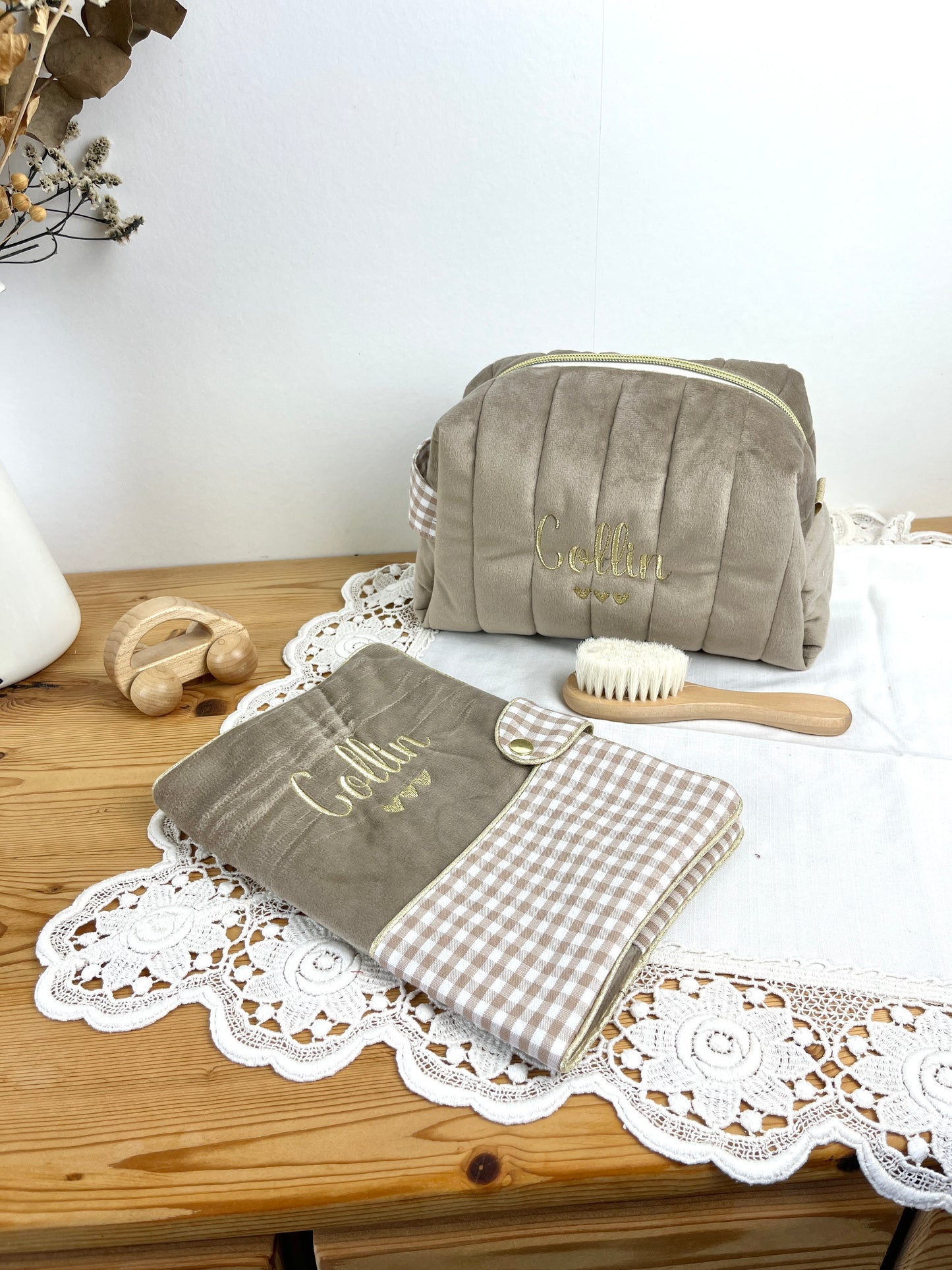 Set includes: Toiletry bag, blanket, doll, notebook cover, and bonnet 