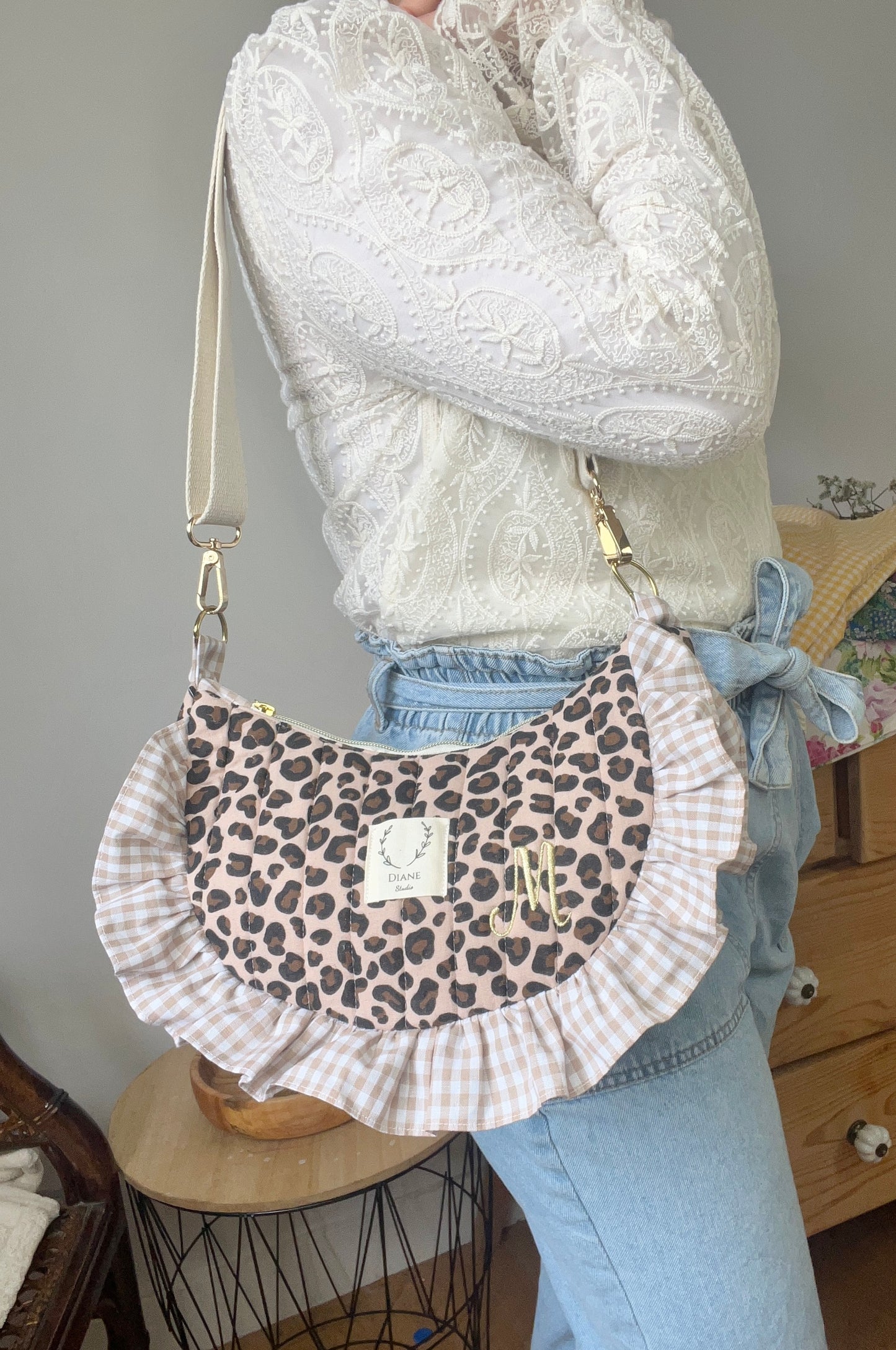 Milan the quilted crescent bag in leopard and beige gingham