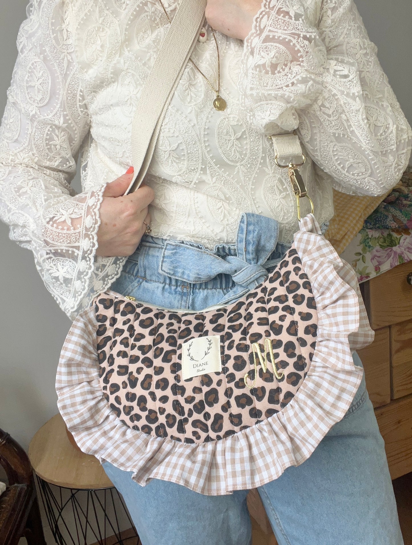 Milan the quilted crescent bag in leopard and beige gingham