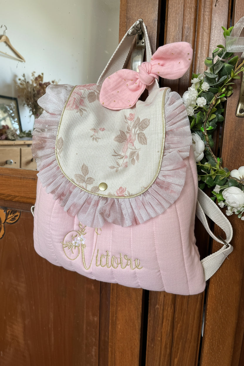 The Eglantine jacquard pink glitter backpack