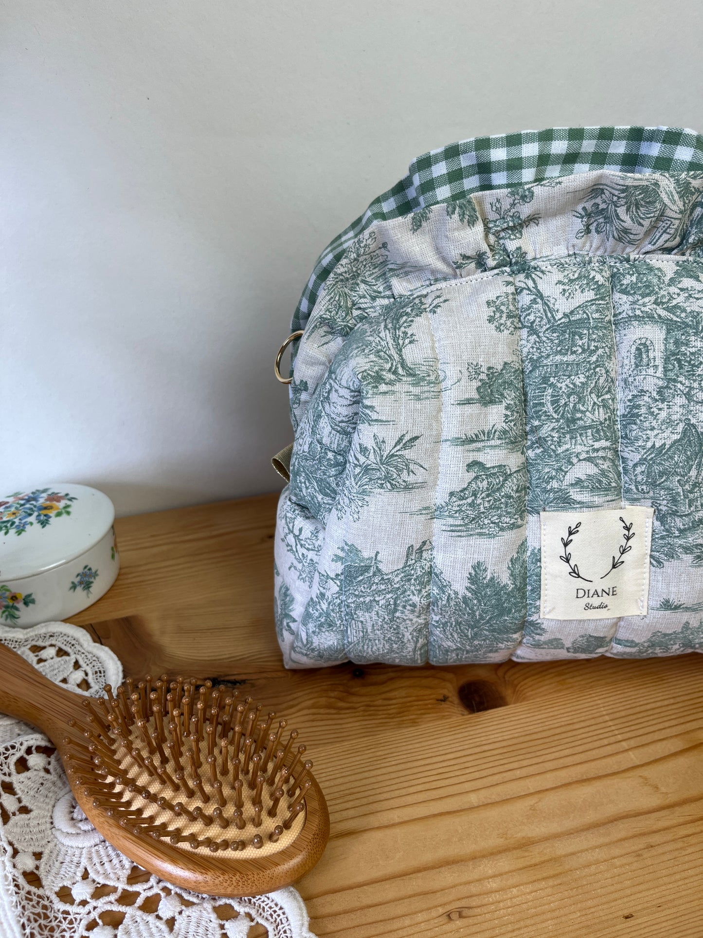 Colette's quilted toiletry bag and its bow