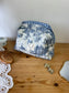 Colette's quilted toiletry bag and its bow