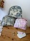 Colette's quilted toiletry bag and its bow