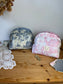 Colette's quilted toiletry bag and its bow