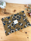 Babette the flat jacquard floral clutch