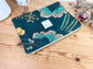 Babette the flat coated foliage pouch
