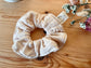 Gold glittery gauze scrunchie