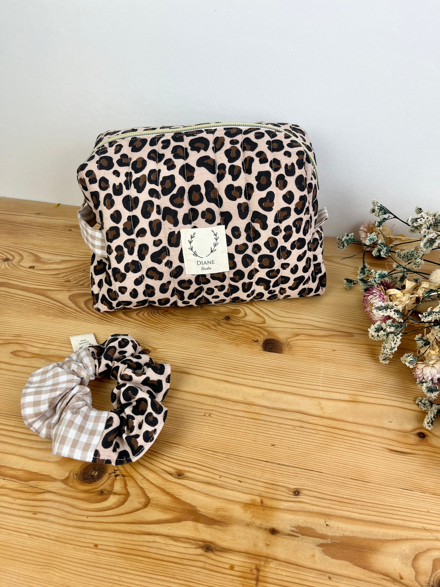 Set: toiletry bag and leopard print scrunchie 