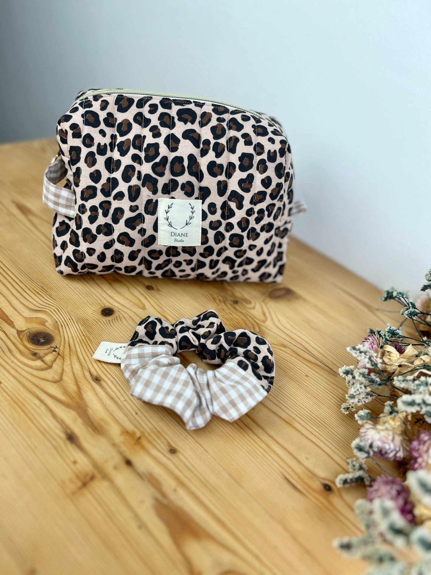 Set: toiletry bag and leopard print scrunchie 