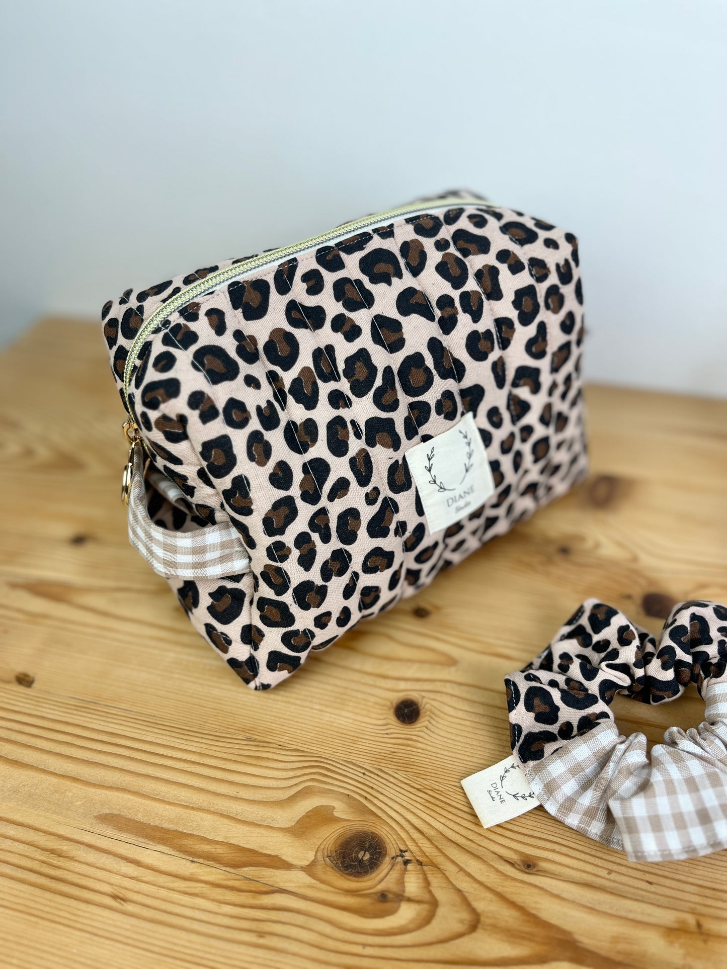 Set: toiletry bag and leopard print scrunchie 