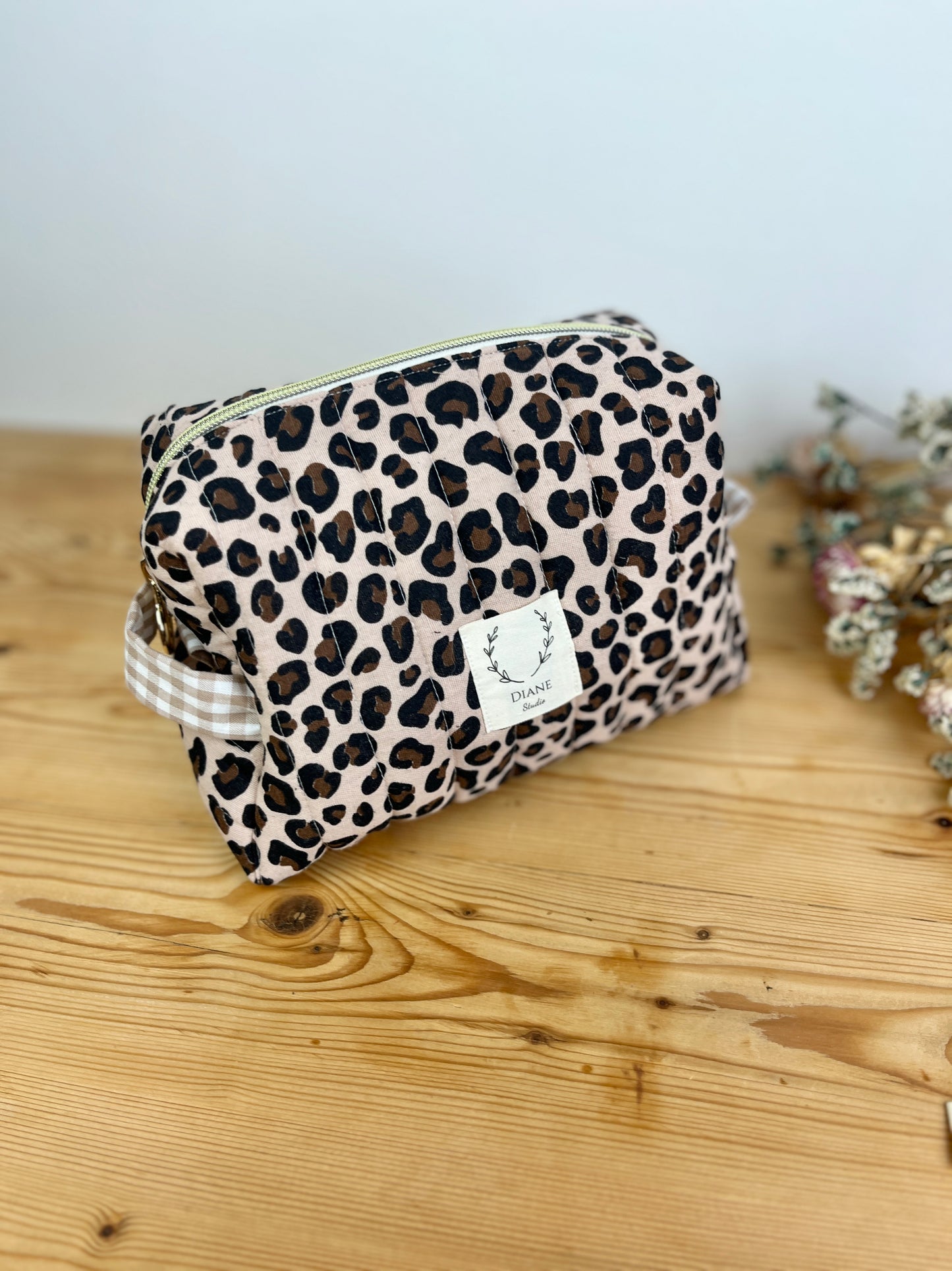 Set: toiletry bag and leopard print scrunchie 